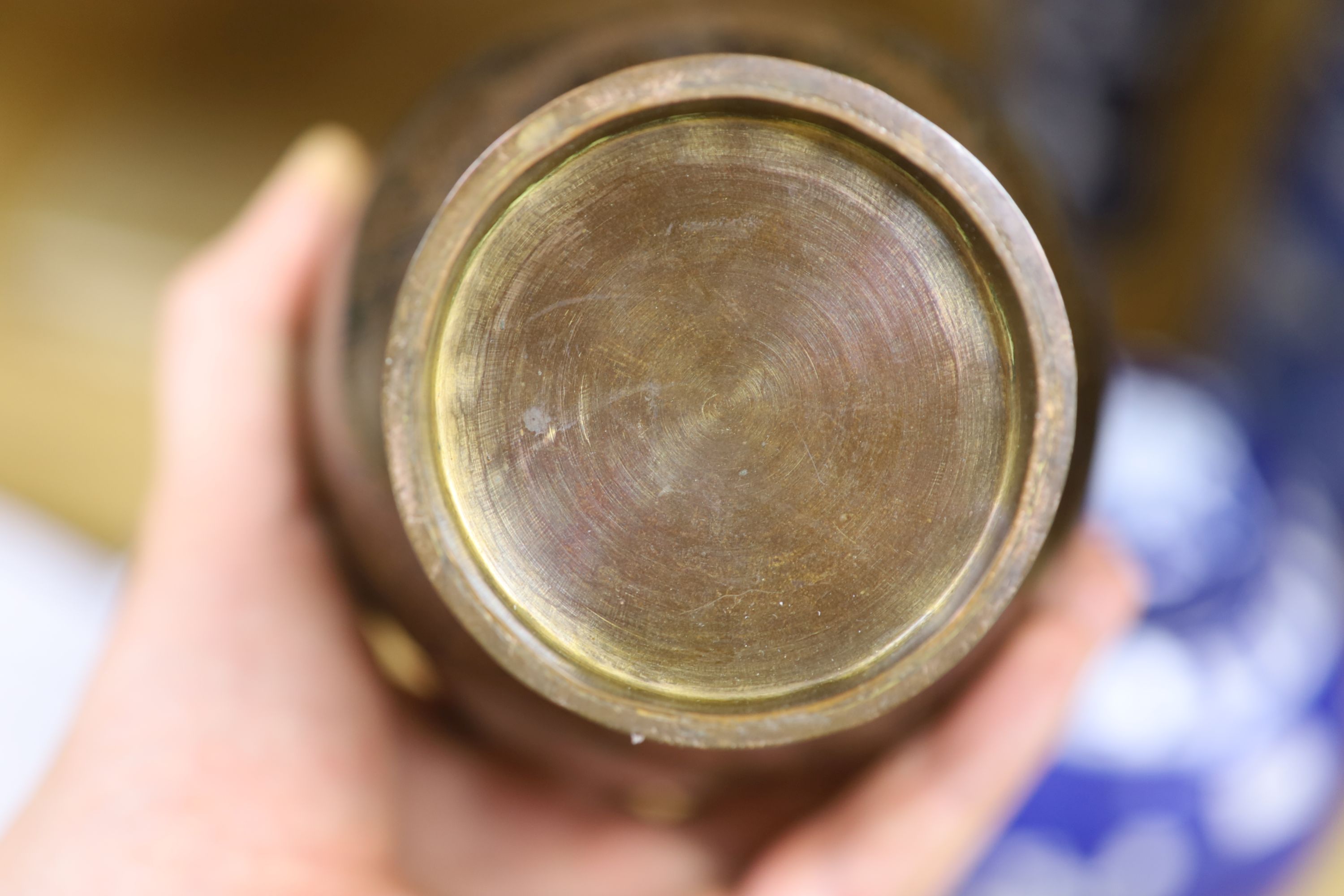 A Chinese blue and white cylindrical vase, another vase and cover and a blue and white jar and cover, together with a cloisonne vase and a bronze censer, tallest 32cm